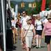 Shoppers fan themselves as they walk down E. Liberty St. during the State St. Art Fair on Wednesday, July 17, 2013. Melanie Maxwell | AnnArbor.com